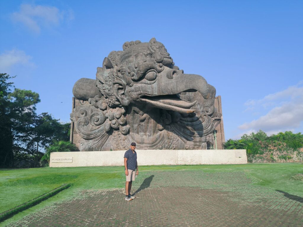 Tourist visiting GWK statue with Bali private driver service