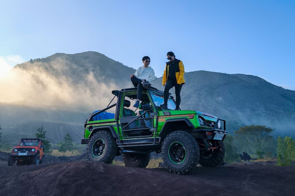 Couple exploring Bali with private driver and jeep tour