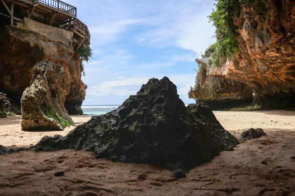 Suluban Beach Bali cave entrance and blue ocean – Uluwatu private driver Bali