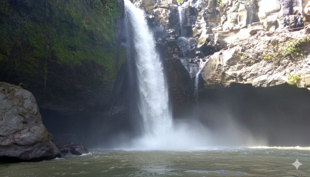 tegenungan Waterfall during Bali Waterfall and Temple Tour with natural rock formations in Bali