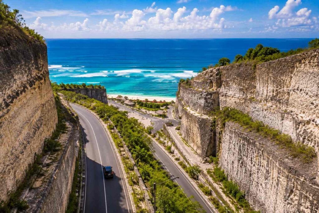 Scenic road in Melasti Beach travel guide with panoramic Indian Ocean cliff views