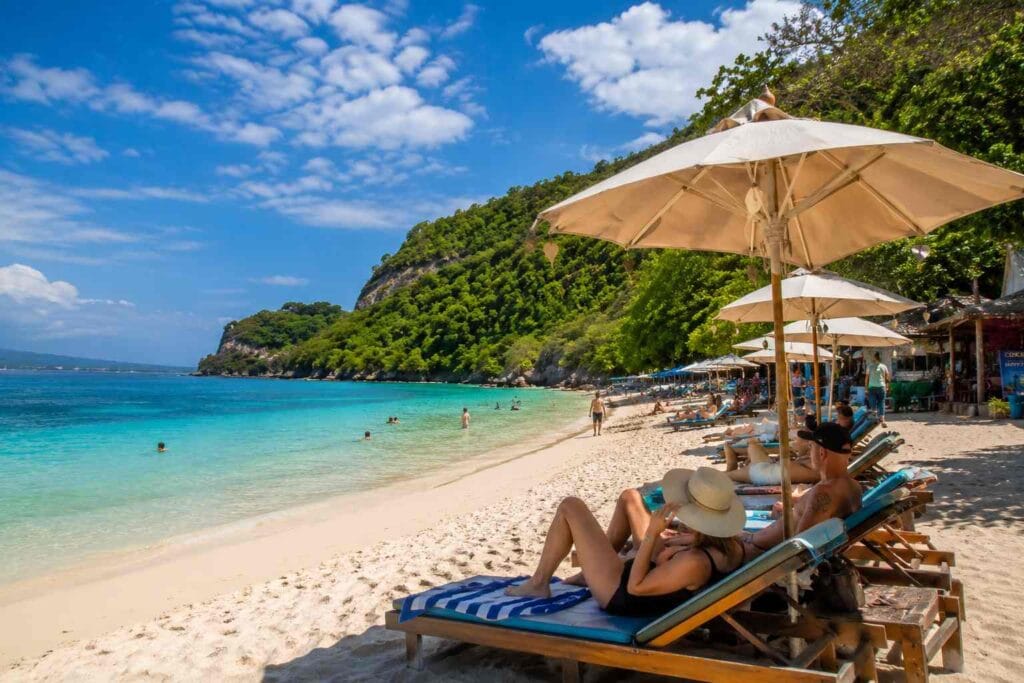 Tourists visiting Virgin Beach Karangasem Bali with a private driver