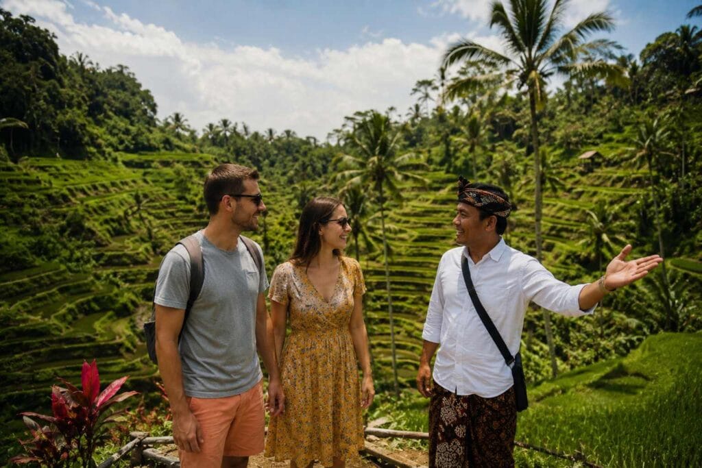 Bali Driver for Cruise Passengers guiding an international couple through Tegallalang Rice Terrace during a private shore excursion from Benoa Port.