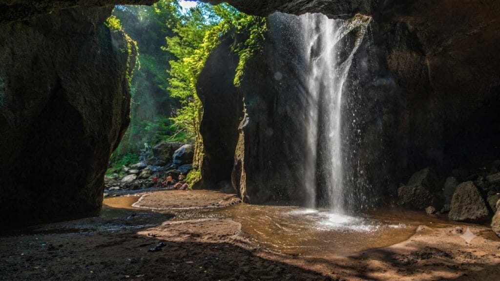 Traveler visiting Goa Raja Waterfall Bali